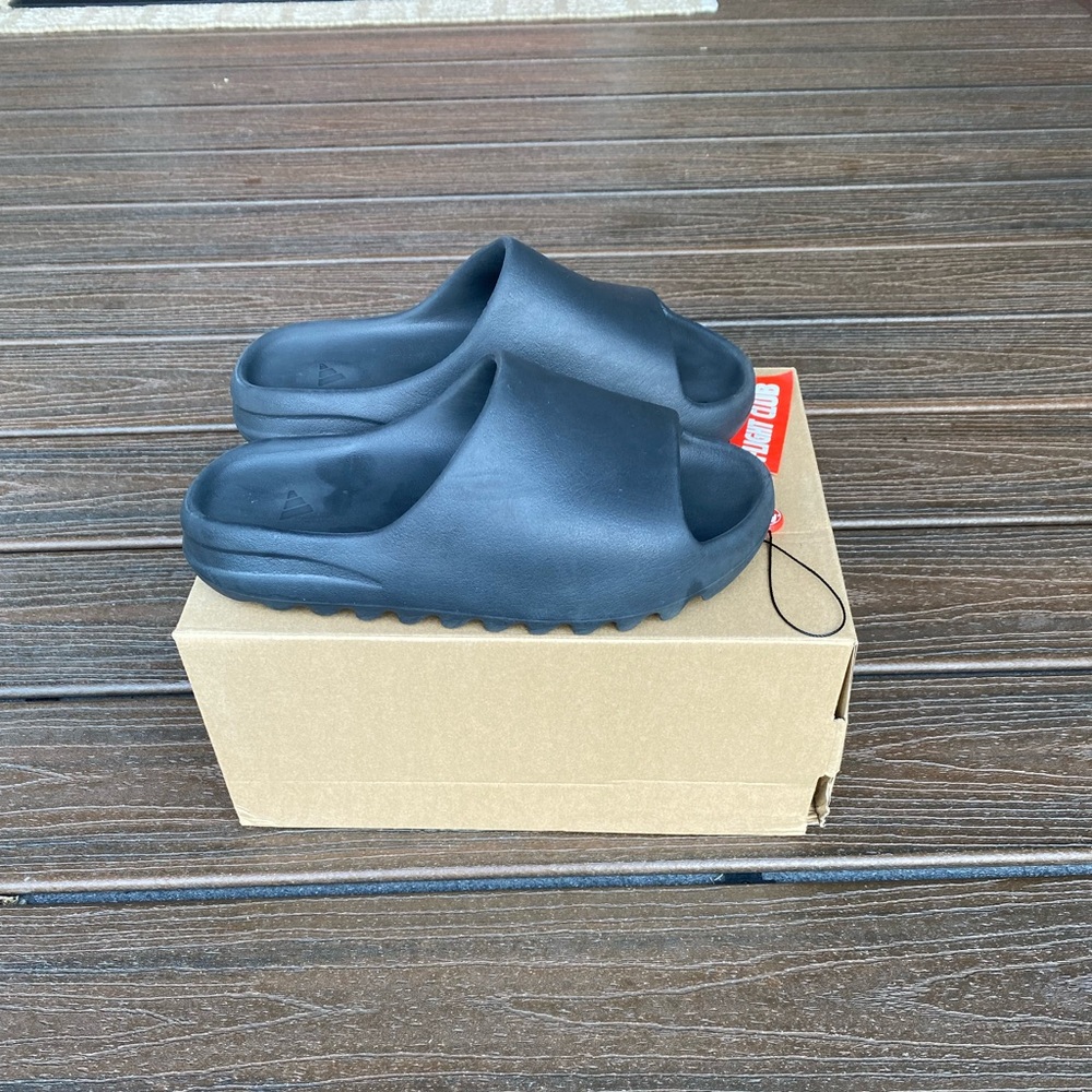 Yeezy Slides size 9 (they run small, will fit a size 8 not a size 9).